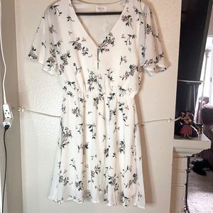 Sienna sky floral white casual mini dress.